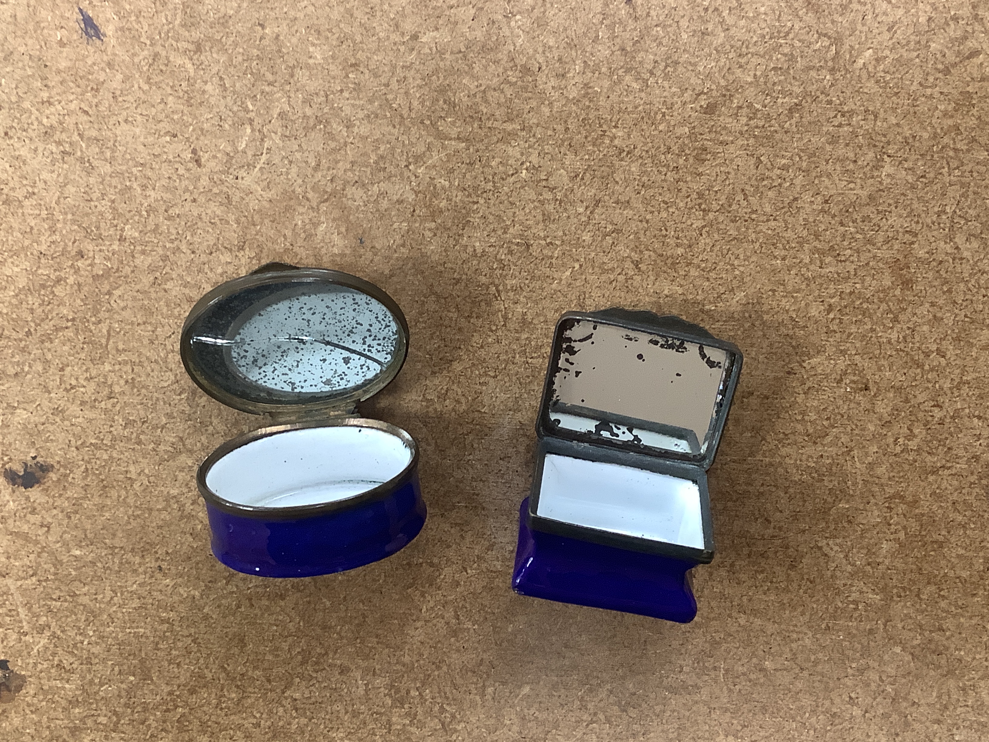 Two South Staffordshire enamel sweetheart patch boxes and two similar snuff boxes, three South Staffordshire enamel pill boxes, all late 18th/early 19th century, South Staffordshire enamel cup and associated cover and a